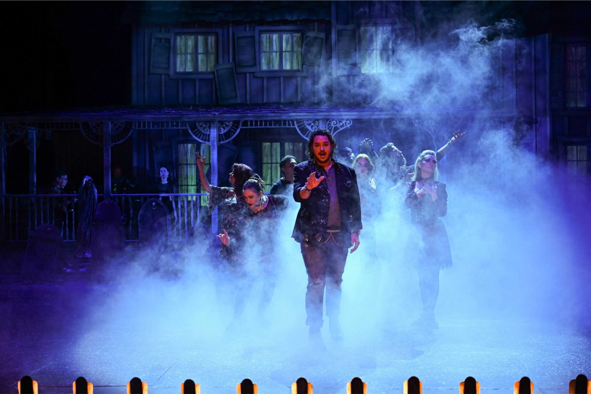 A group of people singing surrounded by smoke